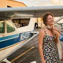 A portrait session beside the aircraft on the ramp